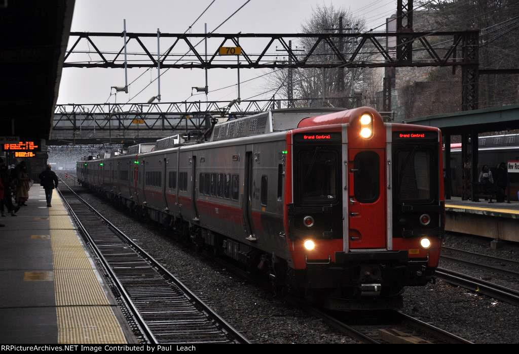 Commuter train cruises west